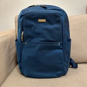 NWOT Tumi nylon backpack, blue with tan leather accents and laptop sleeve!